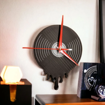 Wall clock in the shape of a vinyl record